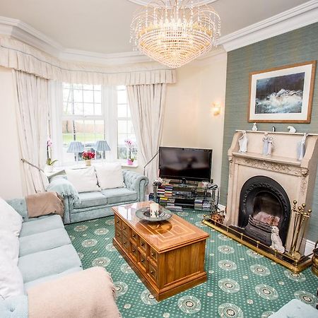 Park Lodge Guest House Уитли-Бей Экстерьер фото